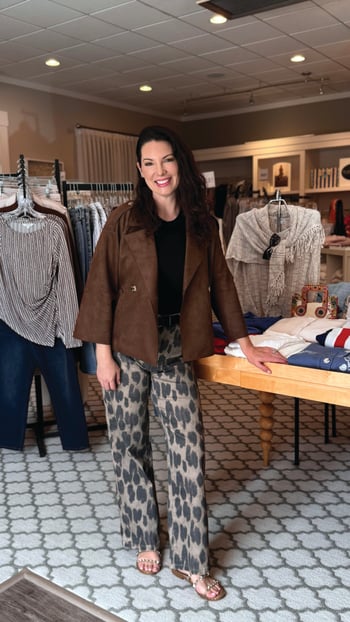A luxe suede jacket paired with bold animal print jeans is the choice for Fall.